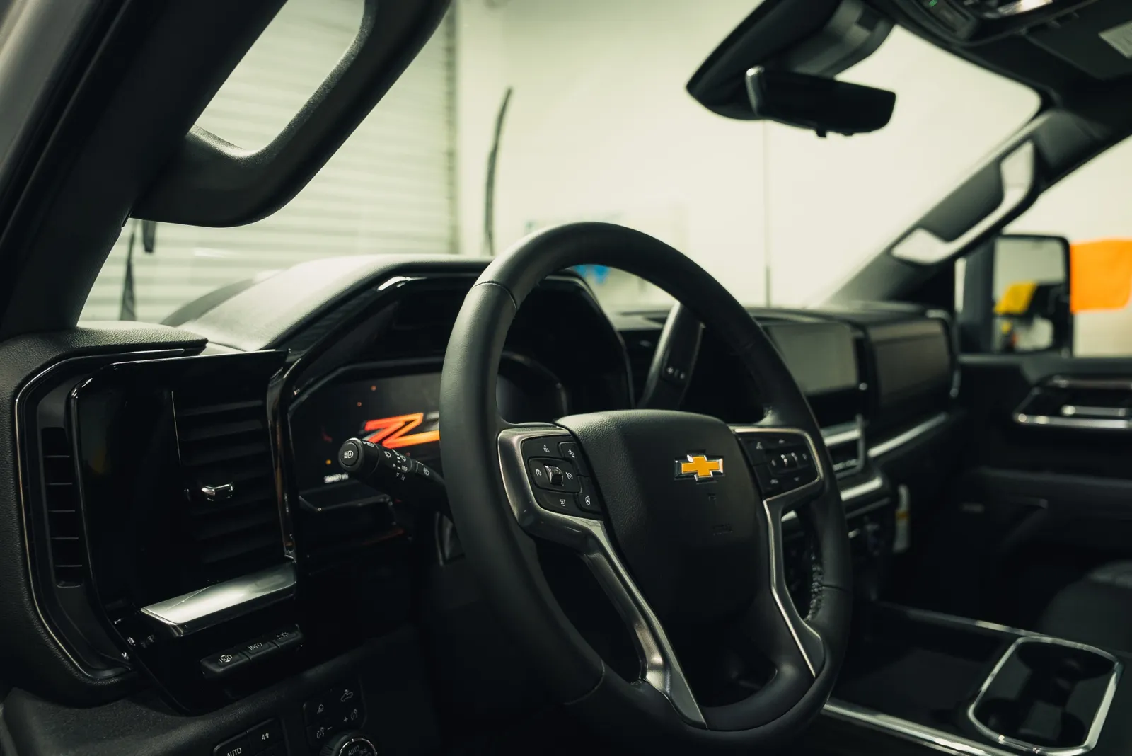 Steering wheel and dashboard inside the Silverado 3500HD